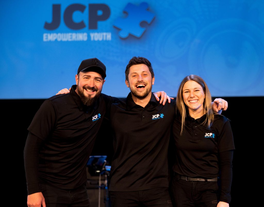 Three JCP Youth presenters together at an event