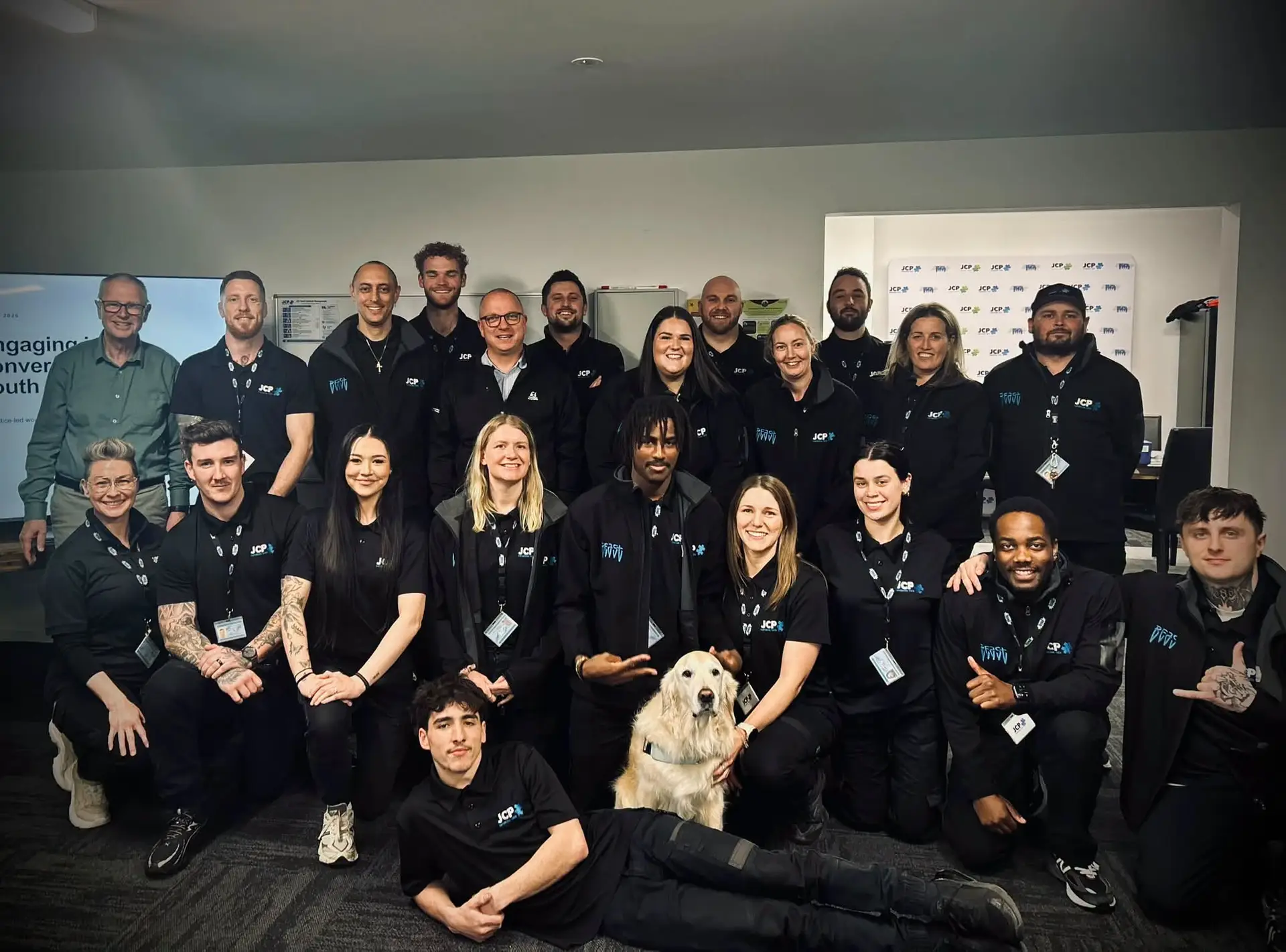 JCP Youth staff and training participants gathered for a group photograph during the sessions with Ken McMaster.