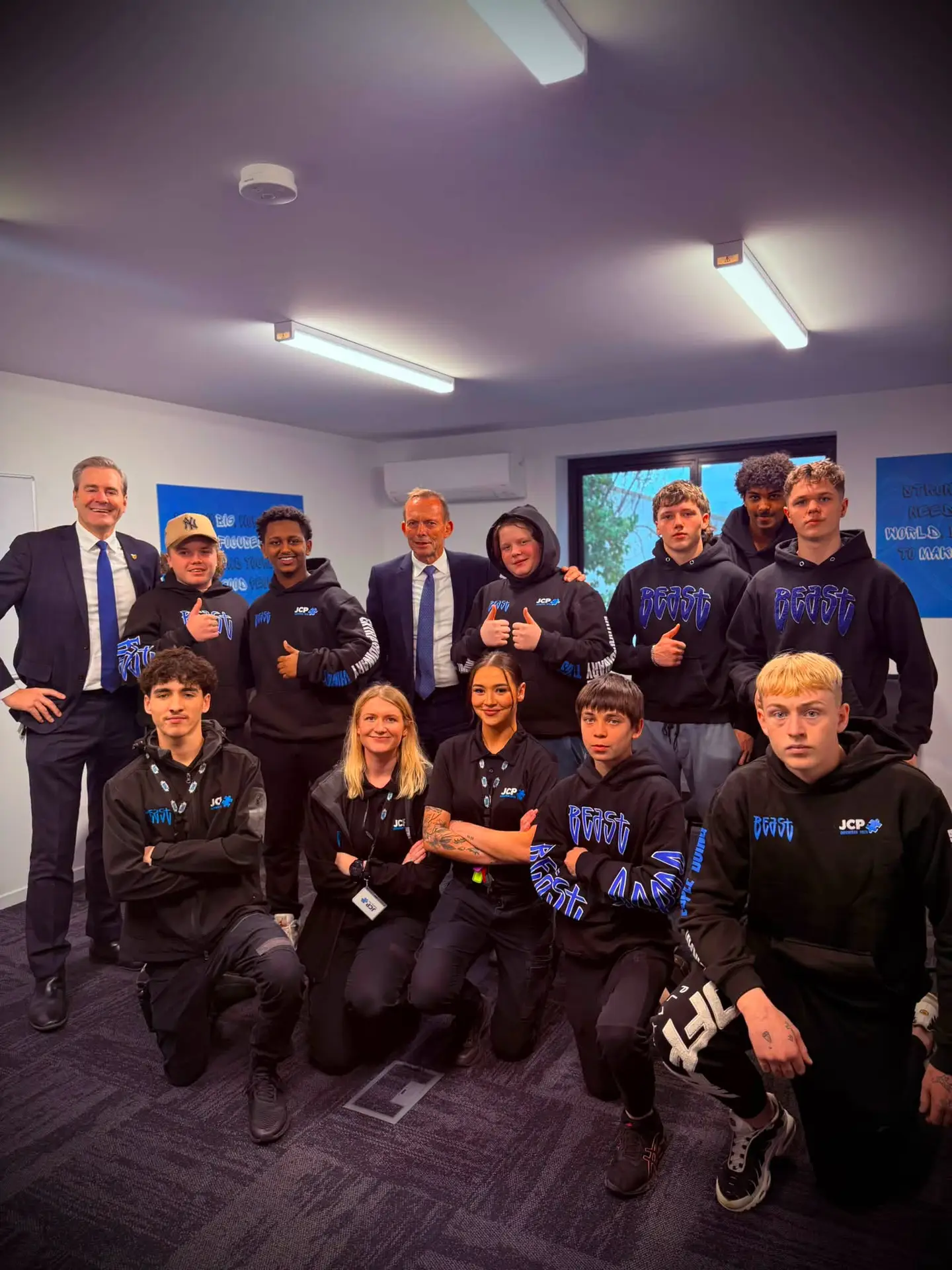 Group photo of visitors, staff and young people at JCP Youth’s Northern Operations Centre.